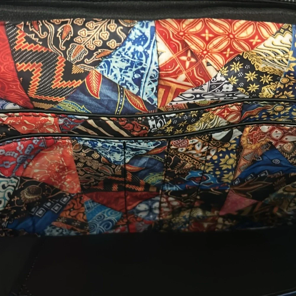 Robert Graham black laptop sleeve and cable bag. New